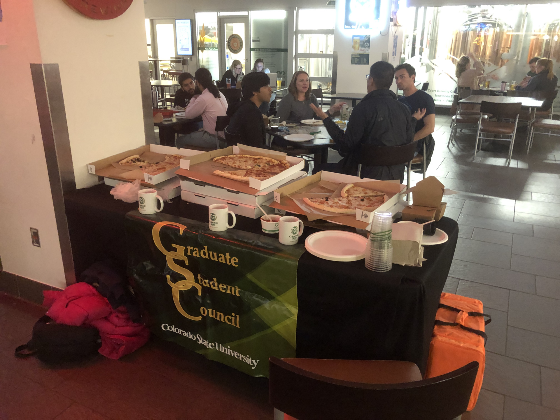 graduate students having a pizza party